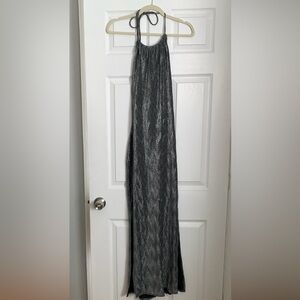 Long silver beautiful dress. Low in the back. From the 12th tribe. Size medium.